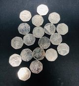 A selection of 19 Fifty Pence Pieces with a Military, Scout and Olympic Theme