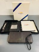 Boxed British American racing F1 promotional organizer folder with paper, calculator and pockets.