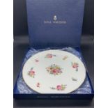 A boxed Royal Worcester floral design plate