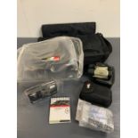 British American racing F1 promotional bag with original contents note pad, camera, binoculars and