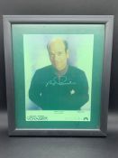 A Framed Robert Ricardo signed photograph 128/150 (This item has a seal to protect the photo)