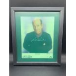 A Framed Robert Ricardo signed photograph 128/150 (This item has a seal to protect the photo)