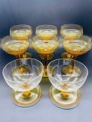 Set of six honey tone champagne coupes and two glass sundae bowls