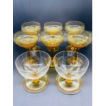 Set of six honey tone champagne coupes and two glass sundae bowls