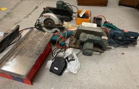 A selection of power tools to include a circular saw, sander, jigsaw etc