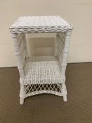White wicker two tiered side table (H58cm D32cm W37cm)