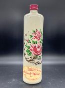 A vintage ceramic floral pattern Kirsch Wasser bottle screw top gray prink