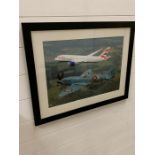A Framed Photograph of a Boeing Aircraft and a Spitfire