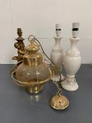 A selection of table lamps including gilt cherub an ship style wall light