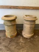 Two reclaimed cannon style chimney pots