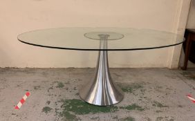 An Oval Glass Dining Table on Central stand