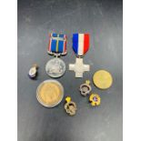 A small selection of Military medals, pin badges and commemoratives