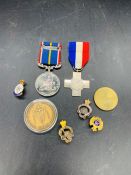 A small selection of Military medals, pin badges and commemoratives