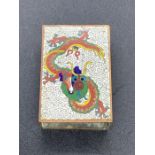 A Cloisonne Chinese Dragon themed matchbox holder.