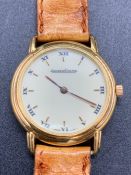 A Jaeger LeCoultre Odysseus Ladies 18 ct gold watch on leather strap with original paperwork and box