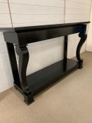 A black rectangular console table