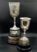 Two Hallmarked silver trophies on stands for Lawn Bowls, one Victorian.(Approximate silver weight is