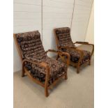 A pair of late 40's Bentwood rocker chairs by upholsterers Christie Tyler. W 63cm x D76cm x H89cm