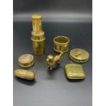 A Selection of Brass Curios to include measuring tapes etc.