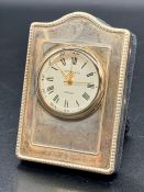 A Kitney & Co Hallmarked silver clock.