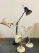 Three Anglepoise desk lamps in a utility design, one Herbert Terry in black