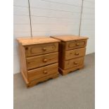 A pair of pine bedsides tables (H65cm W56cm D46cm)