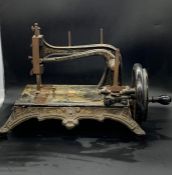 A Late 19th Century Thomas McGrah 'Triumph' sewing machine, retailed by J Reeber of Marseille