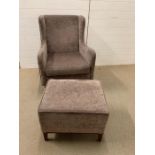 Small ottoman and matching upholstered wingback chair