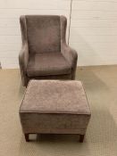 Small ottoman and matching upholstered wingback chair