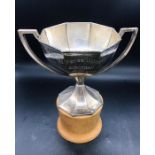 A Hallmarked silver trophy on wooden stand Birmingham Hallmark 1939 by A.J Zimmerman Ltd. (