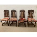 Four Jacobean style dining chairs, caned central back panel with carved cherubs and angels