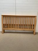 An oak six foot bedframe with all fittings and instructions