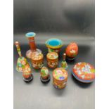 A Selection of Contemporary Chinese Cloisonne items, red grounds.