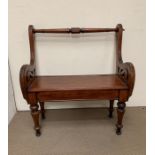 An Arts and Crafts Oak Window Seat with scrolled ends and hinged box seat. 86L x 47D x 92H