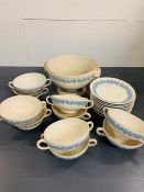A Selection of Wedgwood embossed Queens ware ten place soup bowls, saucers and a tureen.