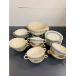A Selection of Wedgwood embossed Queens ware ten place soup bowls, saucers and a tureen.