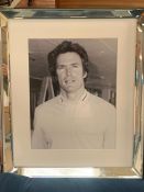 A black and white print of Clint Eastwood in a mirrored frame