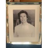 A black and white print of Clint Eastwood in a mirrored frame