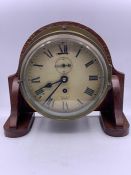 A mounted brass ship bulkhead clock by Smiths Empire (H22cm W26cm D11cm)