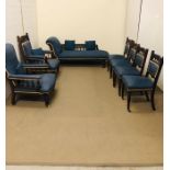 A Salon suite comprising Chaise Longue, two armchairs and four chairs, on castors in a blue fabric.