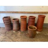 Six terracotta chimney pots various sizes