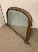 An over mantle mirror