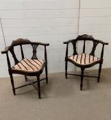 Two mahogany corner chairs with pierced horizontal slats