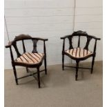 Two mahogany corner chairs with pierced horizontal slats