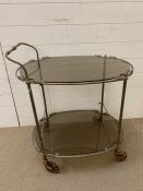 A Drinks trolley with scrolled work and original wheels AF