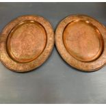 A Pair of Two Copper wall hanging trays with a Medieval Theme.