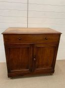 A Chest of drawers opening to a washstand (H90cm W93cm D56cm)