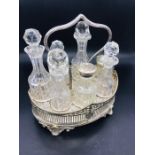 A Victorian Seven bottle cruet set