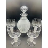 A Lalique Decanter and Four glasses