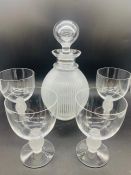 A Lalique Decanter and Four glasses